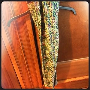 Lularoe leggings. Never worn springy coral/green.